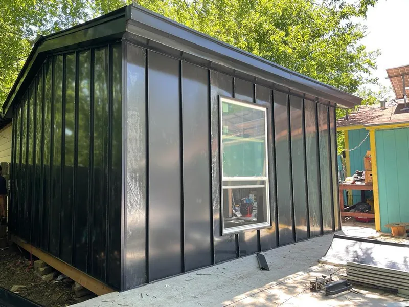 Black standing seam metal wall panels for Metal Roof Installation in Kasson