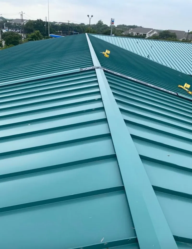 Green commercial metal roof ridge and valley for Metal Roof Repair in Kasson