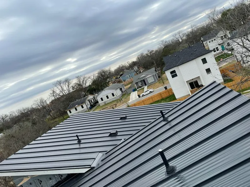 Standing seam metal roof panels with vents for Skylight Repair in Kasson